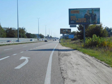 Billboard A in With. Mila, 6х3  с. Мила, траса М-06 "Київ-Чоп" (Житомир), км 26+800 ліво, біля садового центру, за 550м до магазину "Фора", через 625м після АЗС GLUSCO Photo 1