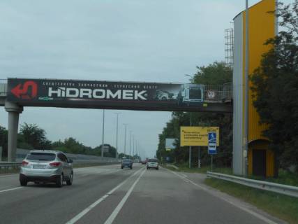 Billboard A in Mriya, 6х3  s. Mria, trasa M-06 "Kiiv-Cop" (Zitomir), km 28+950 pravo, avtobusna zupinka Photo 1