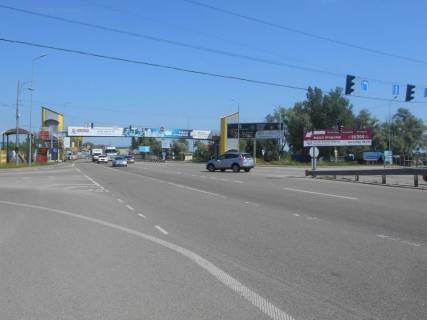 Billboard A in Khodosivka, 12х3  Dniprovs'ke sose, trasa N-01 "Kiiv-Znam'anka", km 23+650 livo, povorot na s. Hodosivku, bila AZS UPG, cerez 150m pisla TC "MegaMarket", pravij Photo 1