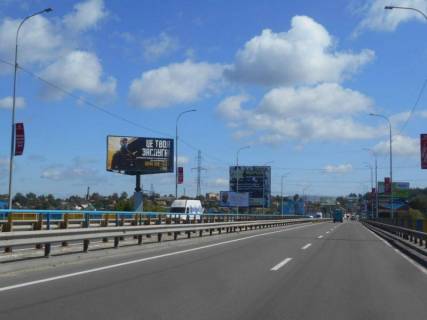 Billboard B in Irpin, 8х4  m. Irpin', trasa M-07 "Kiiv-Kovel'", km 23+150 pravo, mist cerez r. Irpinka, viizd z mista, cerez 425m pisla AZS OKKO Photo 1