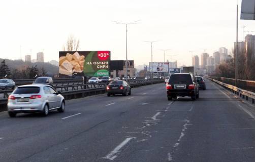 Billboard B in Kyiv, 3х6  Promislova-Pivdennij mist 9/2 (A) (rozpodiluvac) na b-r Druzbi Narodiv,Demiivs'ku pl Photo 1
